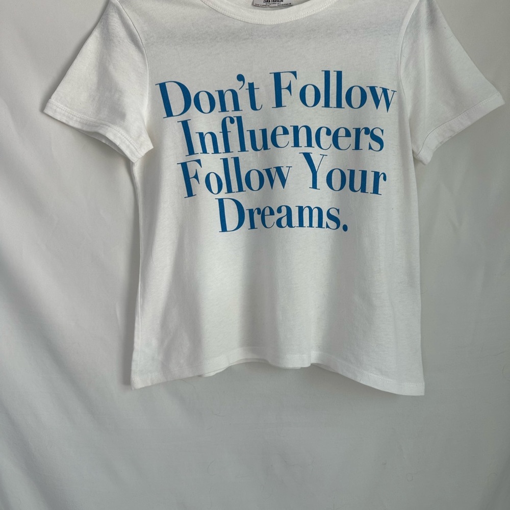 White Graphic Tee with Blue Text